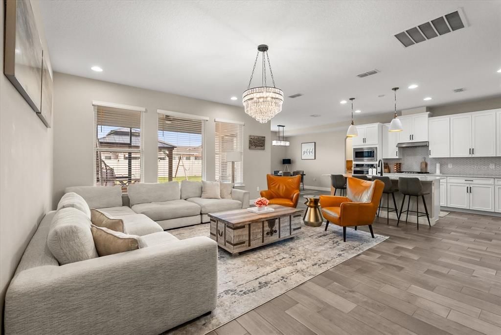 Chandelier, Interior, Kitchen, Living room, Pendant Lights, Recessed Lighting, Wood Texture Flooring
