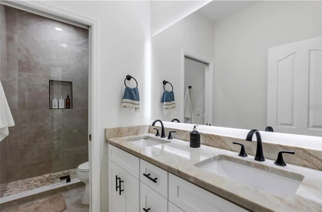 Bathroom, Dual Sink Vanities, Glass Shower, Interior, Marble Walls