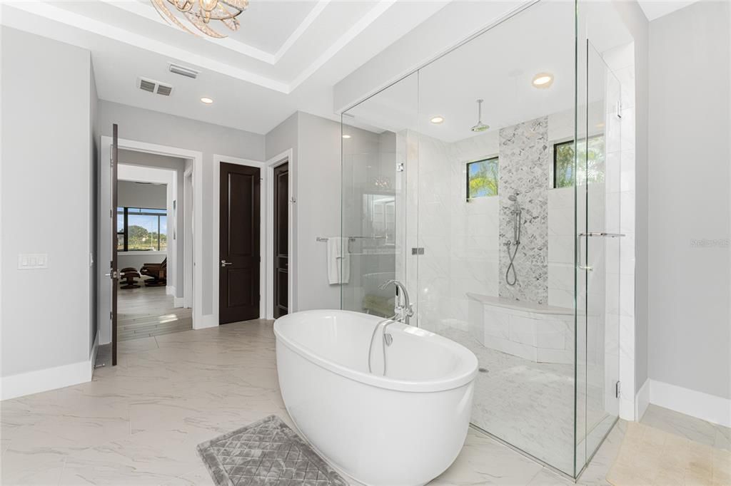 Bathroom, Free Standing Baths, Glass Shower, Interior, Marble, Marble Walls, Recessed Lighting
