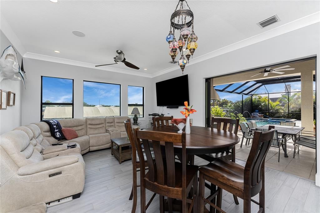 Dining room, Interior, Living room, Recessed Lighting, Sun Room, Wood Texture Flooring