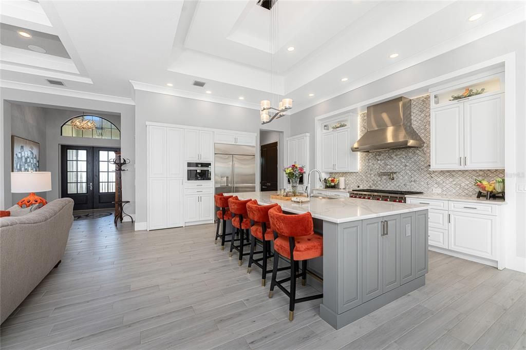 Chandelier, Interior, Kitchen, Pendant Lights, Recessed Lighting, Stainless Steel Appliances, Wood Texture Flooring