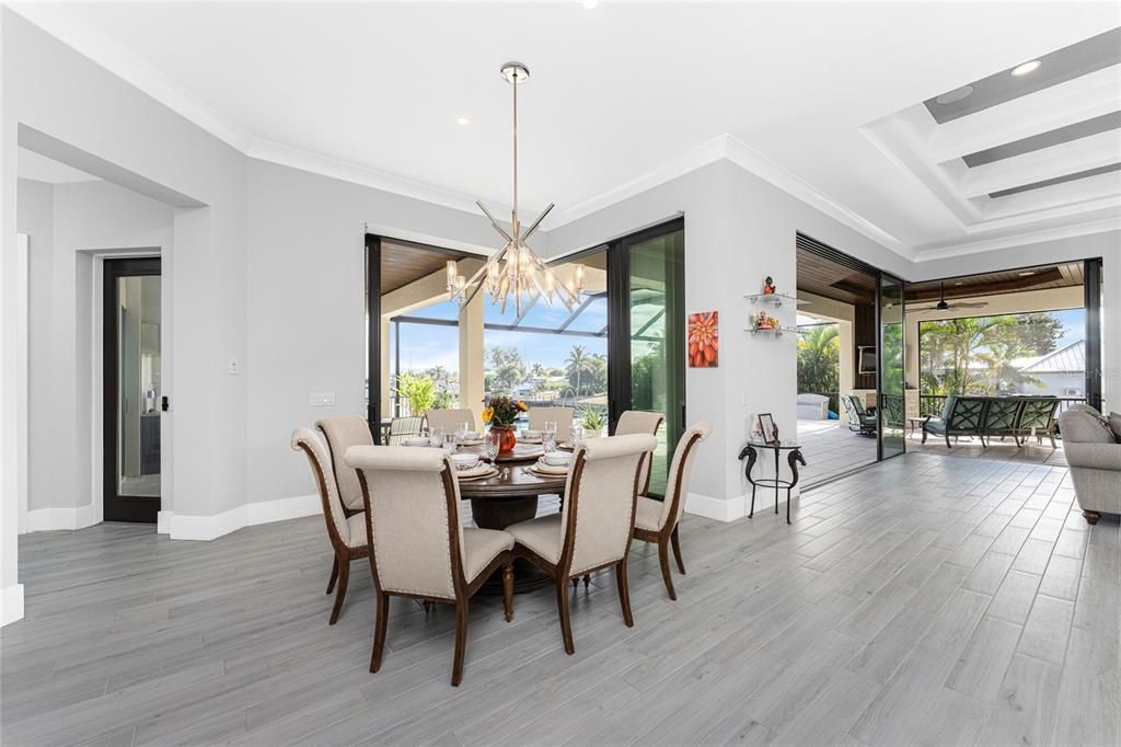 Chandelier, Dining room, Interior, Pendant Lights, Recessed Lighting, Wood Texture Flooring