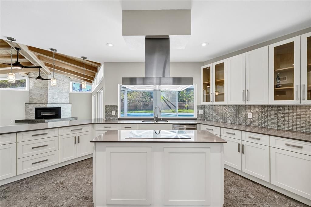 Interior, Kitchen, Pendant Lights, Recessed Lighting, Stainless Steel Appliances, Stone Walls, Wooden Beams