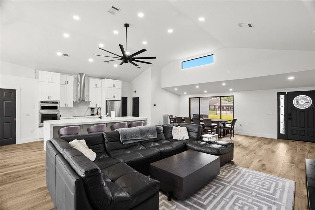 Dining room, Interior, Kitchen, Living room, Pendant Lights, Recessed Lighting, Stainless Steel Appliances, Wood Texture Flooring