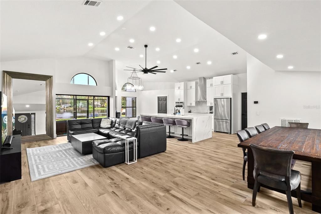 Dining room, Interior, Kitchen, Living room, Pendant Lights, Recessed Lighting, Stainless Steel Appliances, Wood Texture Flooring