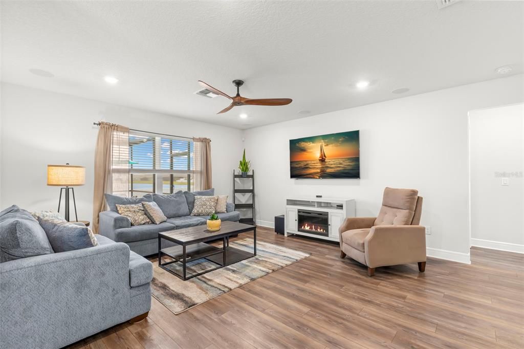 Fireplace, Interior, Living room, Recessed Lighting, Wood Texture Flooring