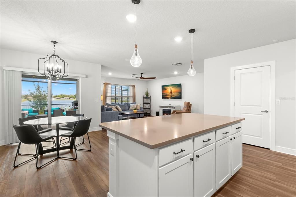 Dining room, Interior, Kitchen, Living room, Pendant Lights, Recessed Lighting, Water, Wood Texture Flooring