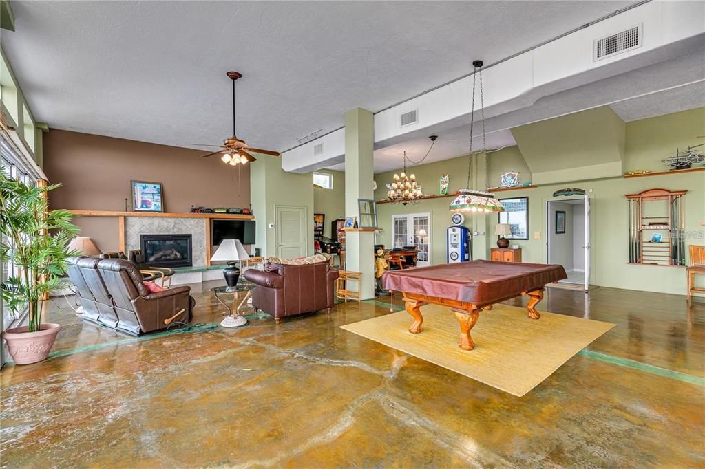 Billiard Table, Chandelier, Fireplace, Game Room, Interior, Living room, Pendant Lights