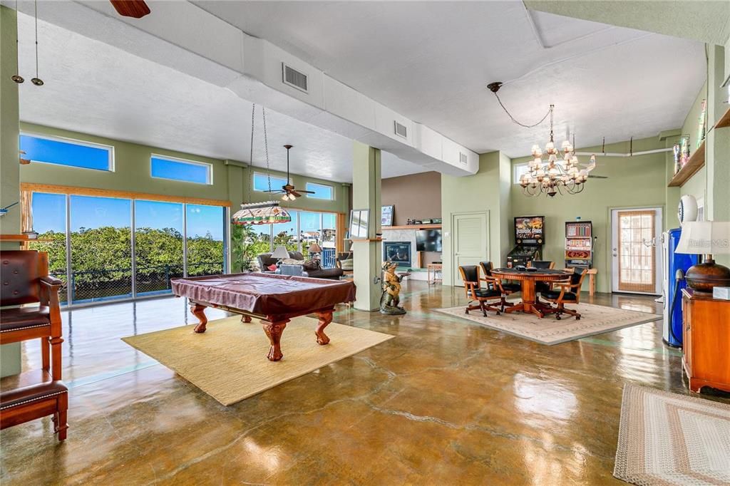 Billiard Table, Chandelier, Dining room, Fireplace, Game Room, Interior, Pendant Lights