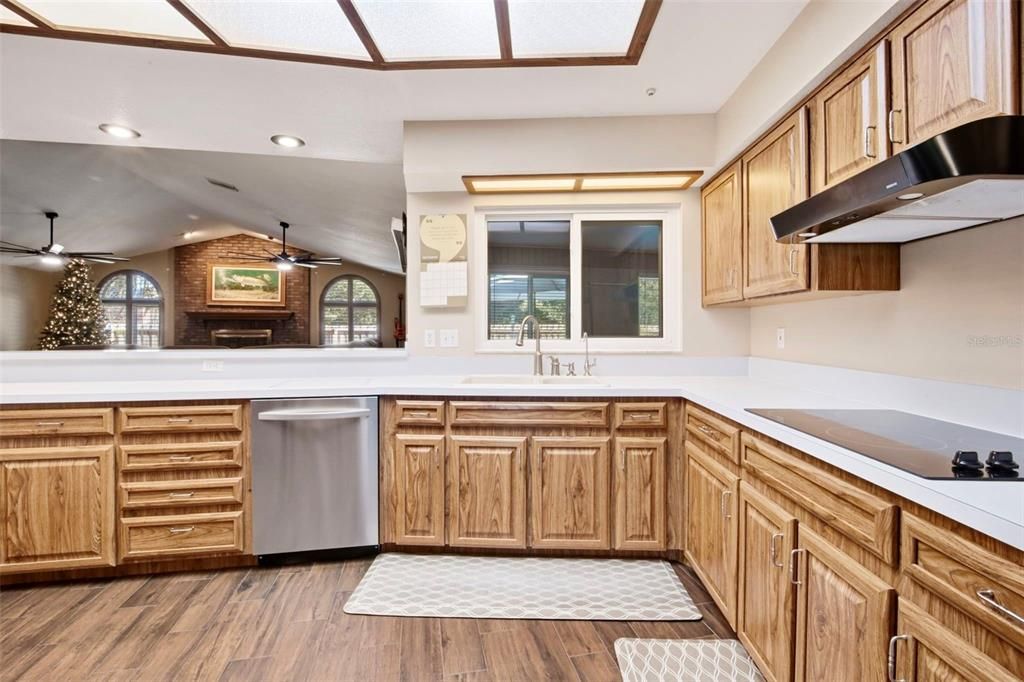 Fireplace, Interior, Kitchen, Recessed Lighting, Stone Walls, Wood Texture Flooring