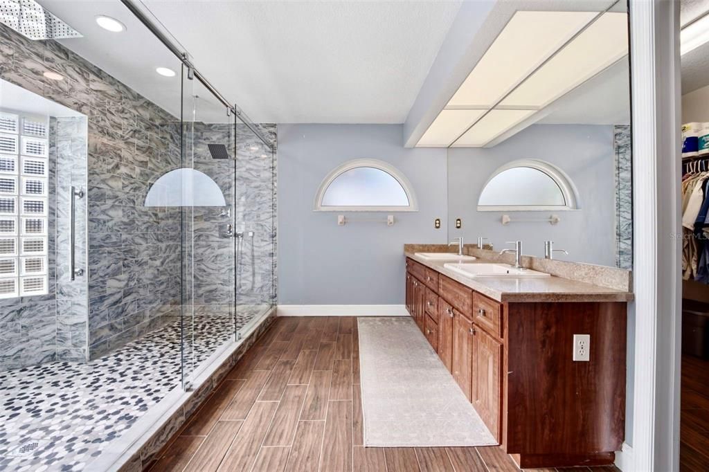 Bathroom, Dual Sink Vanities, Glass Shower, Interior, Recessed Lighting, Wood Texture Flooring