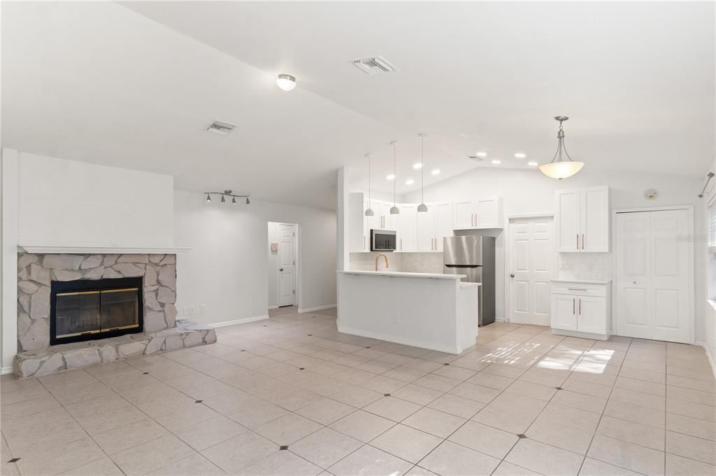 Fireplace, Interior, Kitchen, Pendant Lights, Recessed Lighting, Stainless Steel Appliances