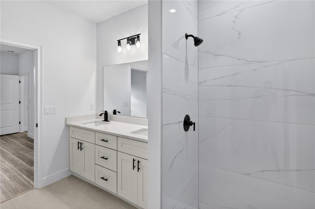 Bathroom, Dual Sink Vanities, Interior, Marble Walls, Wood Texture Flooring