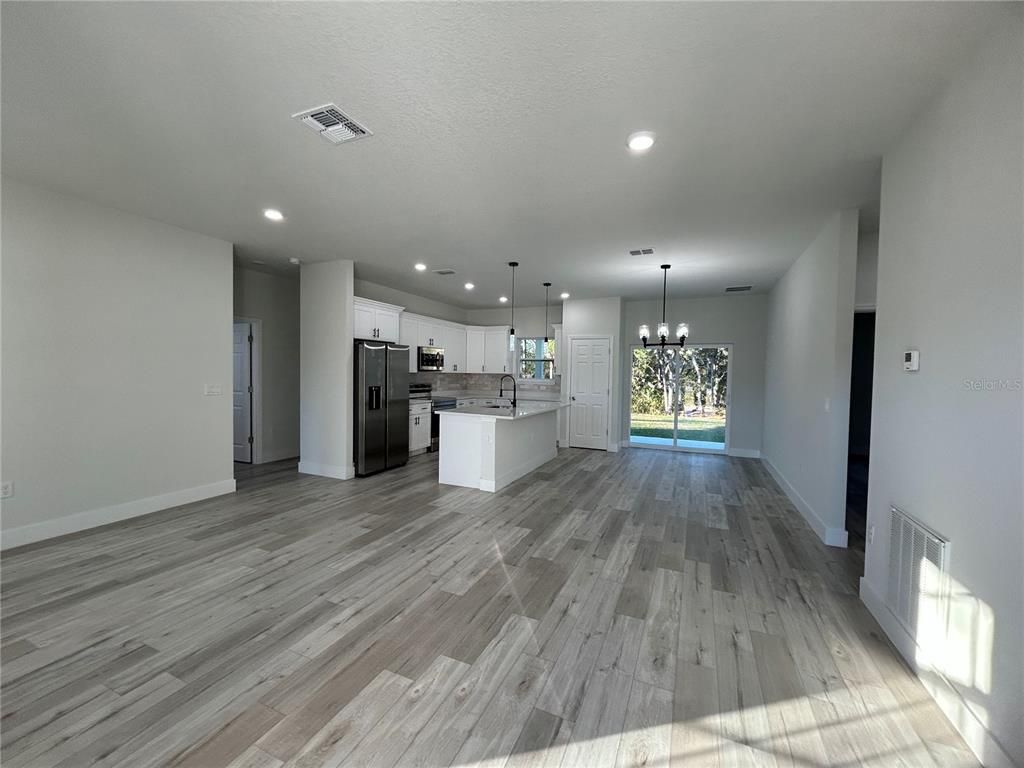 Empty room, Interior, Kitchen, Pendant Lights, Recessed Lighting, Wood Texture Flooring