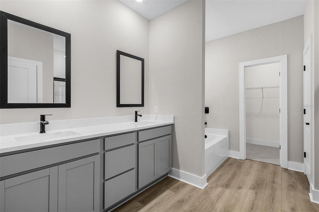 Bathroom, Dual Sink Vanities, Interior, Recessed Lighting, Wood Texture Flooring