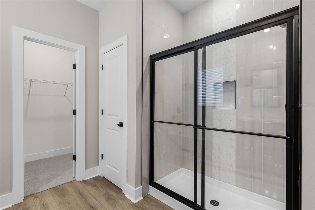 Bathroom, Glass Shower, Interior, Walk-in Closets, Wood Texture Flooring