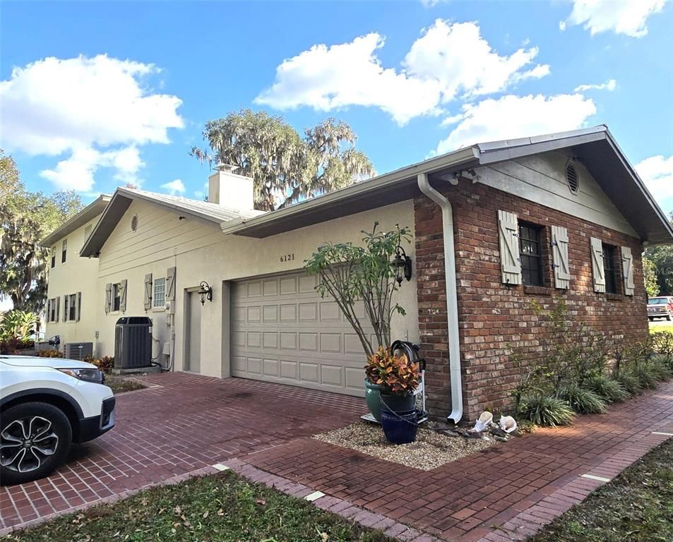 Attached, Exterior, Facade, Brick Facade, Modern