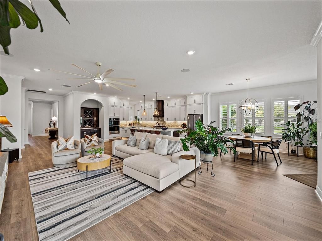 Dining room, Interior, Kitchen, Living room, Pendant Lights, Recessed Lighting, Stainless Steel Appliances, Wood Texture Flooring