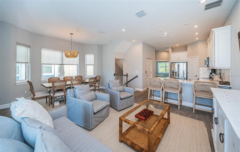 Dining room, Interior, Kitchen, Living room, Pendant Lights, Recessed Lighting, Stainless Steel Appliances, Wood Texture Flooring