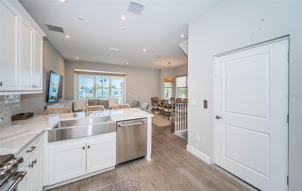 Dining room, Interior, Kitchen, Living room, Pendant Lights, Recessed Lighting, Stainless Steel Appliances, Wood Texture Flooring