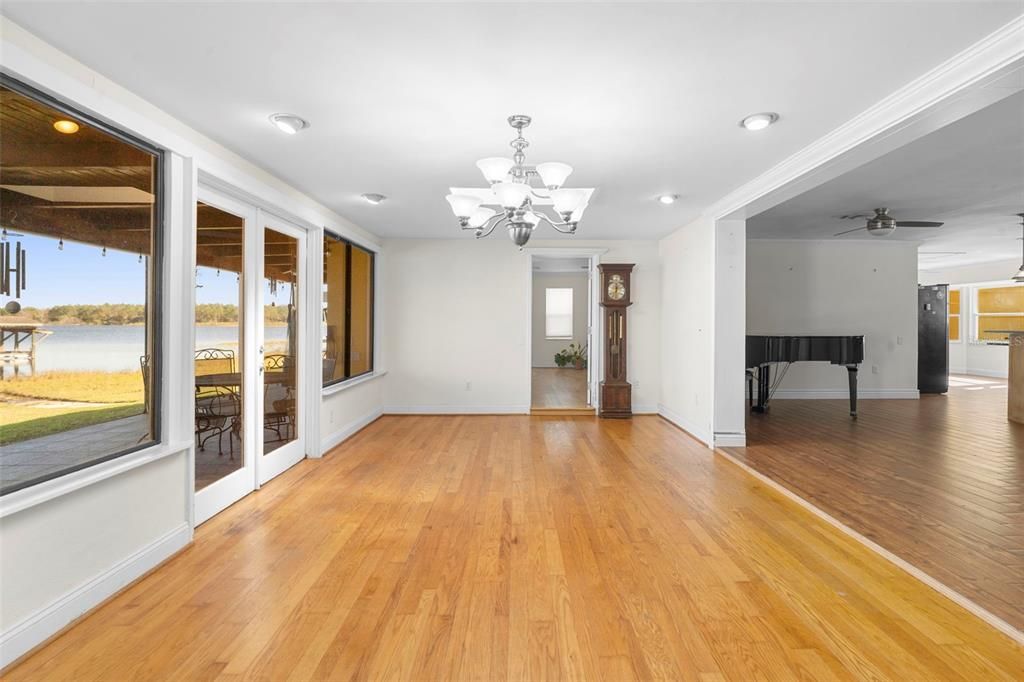 Chandelier, Empty room, Interior, Piano, Recessed Lighting, Wood Texture Flooring