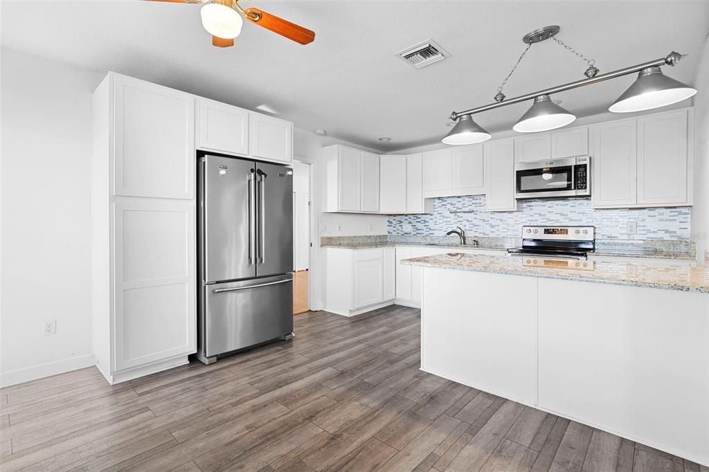 Interior, Kitchen, Pendant Lights, Stainless Steel Appliances, Wood Texture Flooring