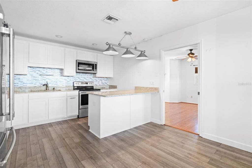 Interior, Kitchen, Pendant Lights, Stainless Steel Appliances, Wood Texture Flooring