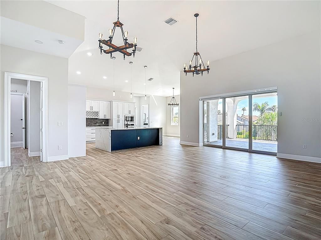 Chandelier, Empty room, Interior, Kitchen, Pendant Lights, Recessed Lighting, Wood Texture Flooring