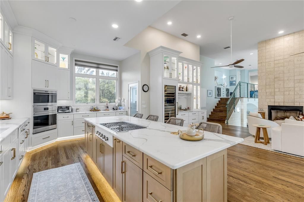 Fireplace, Interior, Kitchen, Pendant Lights, Recessed Lighting, Stainless Steel Appliances, Wood Texture Flooring