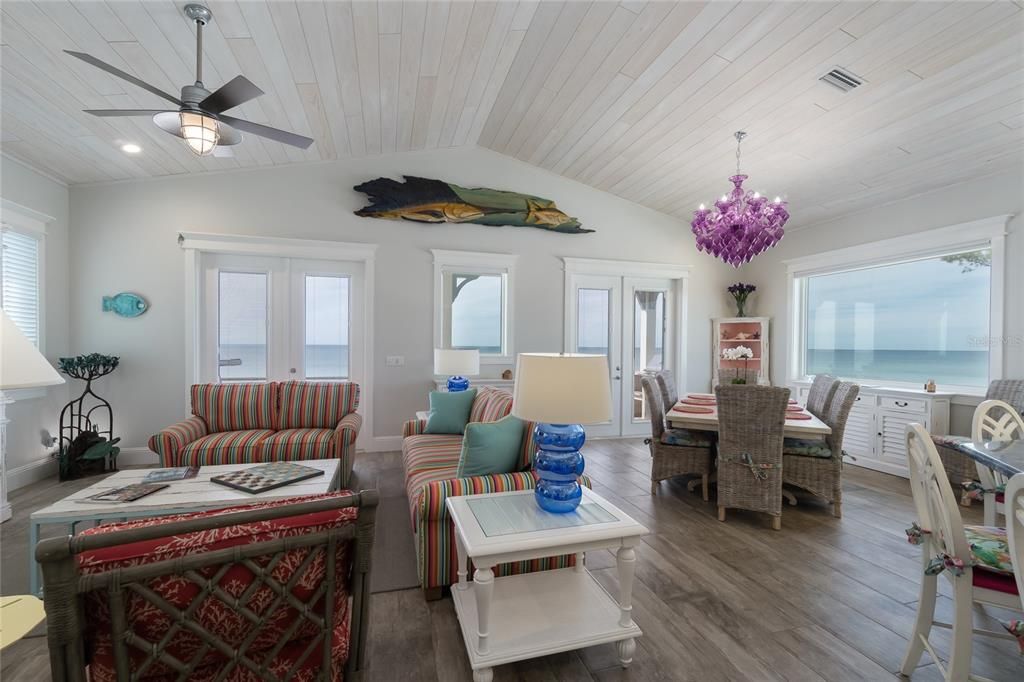 Chandelier, Dining room, Interior, Living room, Recessed Lighting, Water, Wood Texture Flooring