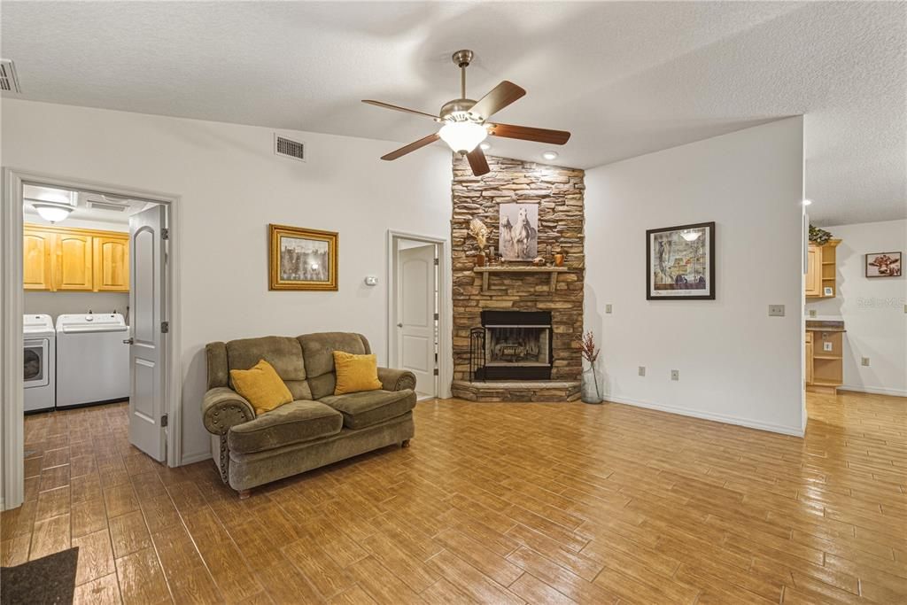 Fireplace, Interior, Stone Walls, Washer, Wood Texture Flooring