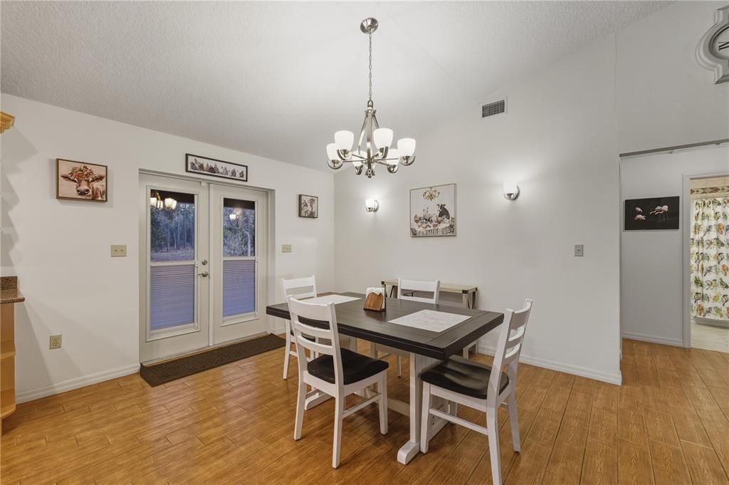 Chandelier, Dining room, Interior, Wood Texture Flooring