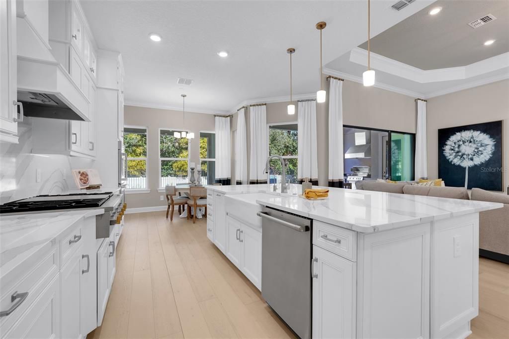 Dining room, Interior, Kitchen, Pendant Lights, Recessed Lighting, Stainless Steel Appliances, Wood Texture Flooring