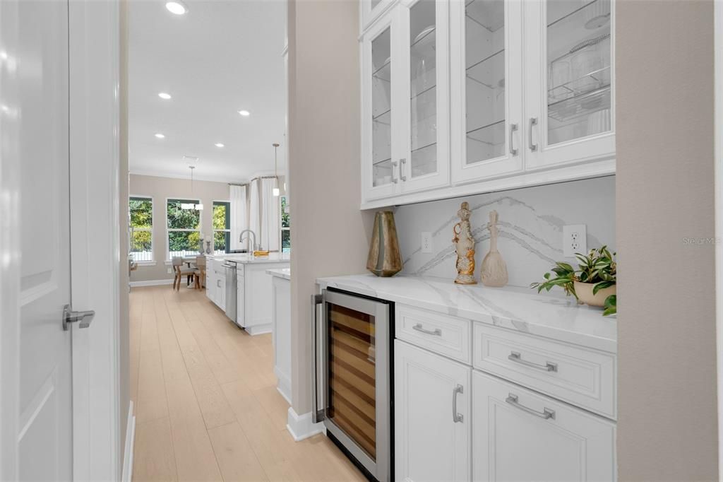 Interior, Kitchen, Marble Walls, Pendant Lights, Recessed Lighting, Wood Texture Flooring