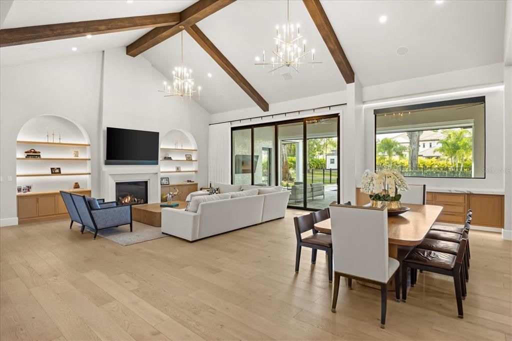 Dining room, Fireplace, Interior, Living room, Pendant Lights, Recessed Lighting, Wooden Beams, Wood Texture Flooring