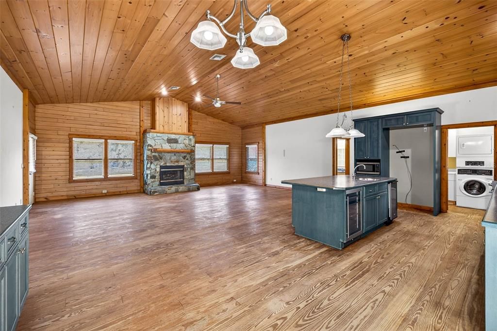 Empty room, Fireplace, Interior, Kitchen, Pendant Lights, Wooden Ceilings, Wood Texture Flooring, Wooden Walls