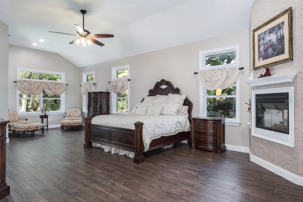 Bedroom, Fireplace, Interior, Recessed Lighting, Wood Texture Flooring