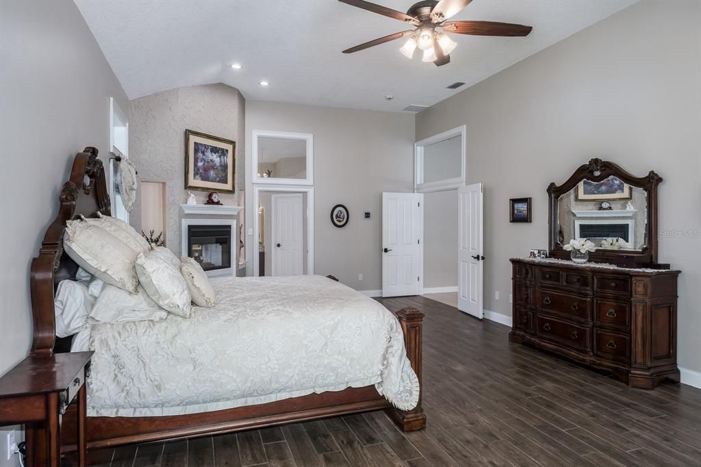 Bedroom, Fireplace, Interior, Recessed Lighting, Wood Texture Flooring