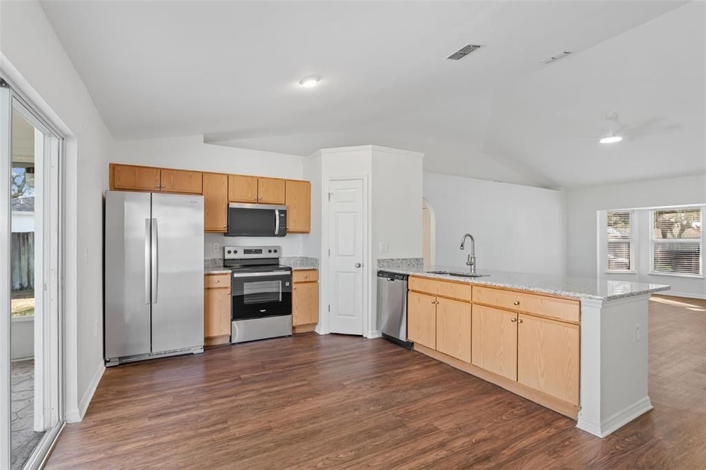 Interior, Kitchen, Recessed Lighting, Stainless Steel Appliances, Wood Texture Flooring