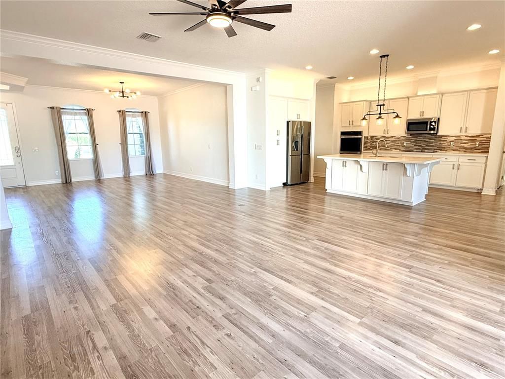 Chandelier, Empty room, Interior, Kitchen, Pendant Lights, Recessed Lighting, Wood Texture Flooring