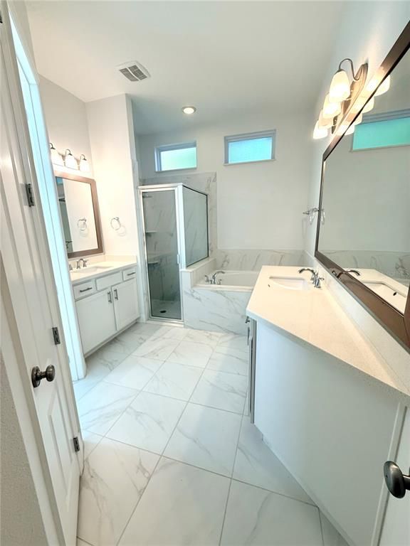 Bathroom, Dual Sink Vanities, Glass Shower, Interior, Marble, Marble Walls, Recessed Lighting