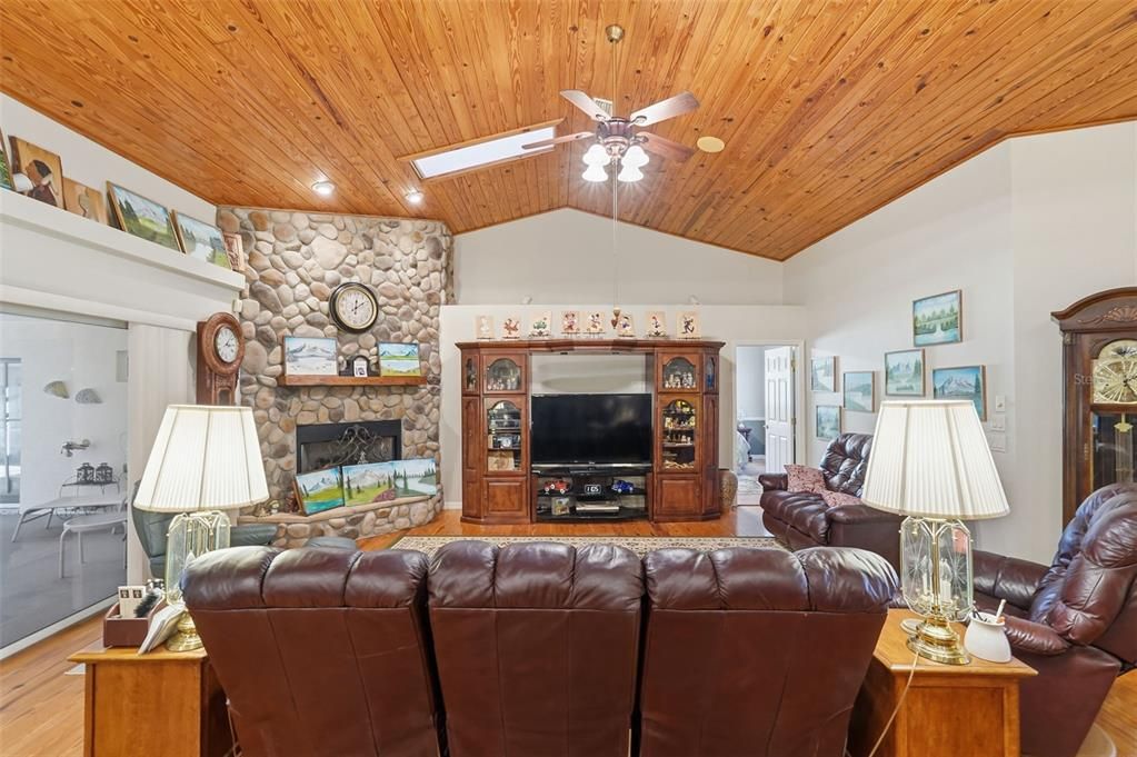 Fireplace, Interior, Living room, Recessed Lighting, Stone Walls, Wooden Ceilings, Wood Texture Flooring