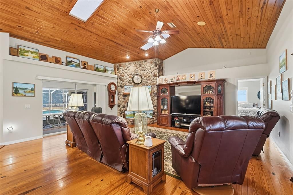 Fireplace, Interior, Living room, Recessed Lighting, Stone Walls, Wooden Ceilings, Wood Texture Flooring