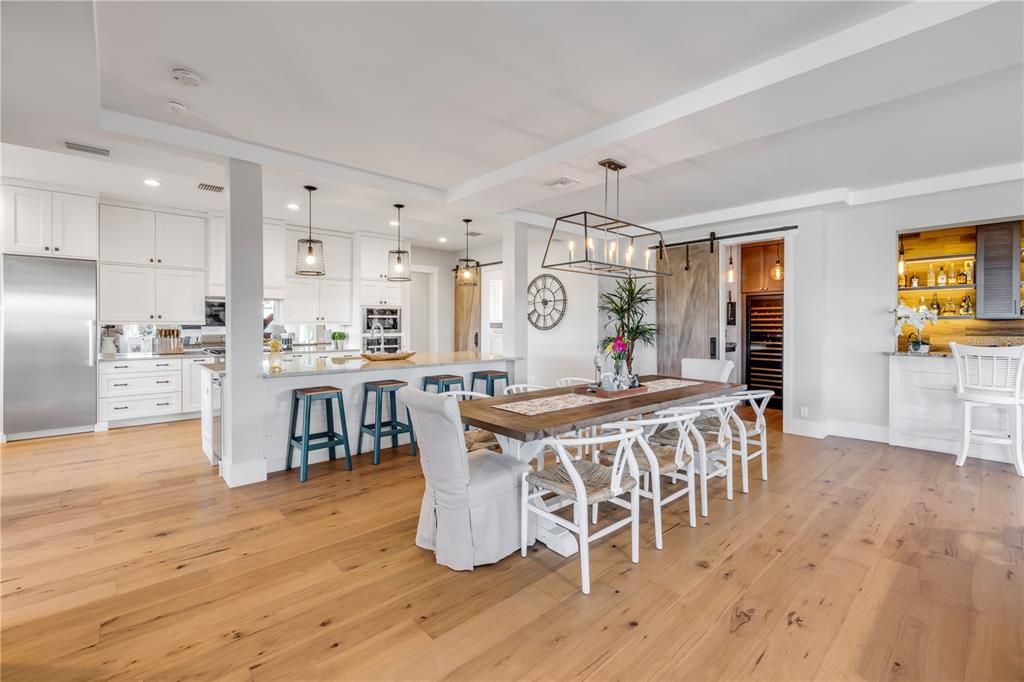 Dining room, Interior, Kitchen, Pendant Lights, Recessed Lighting, Stainless Steel Appliances, Wood Texture Flooring