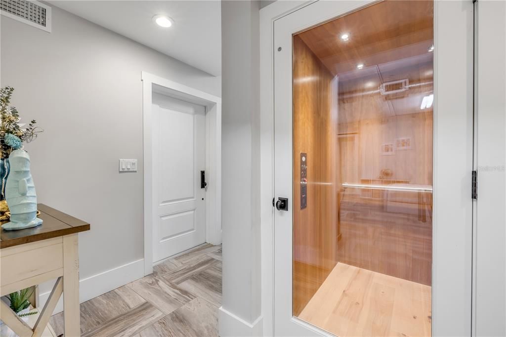 Elevator, Interior, Recessed Lighting, Wooden Ceilings, Wood Texture Flooring, Wooden Walls