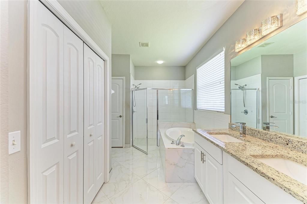 Bathroom, Dual Sink Vanities, Glass Shower, Interior, Marble, Recessed Lighting