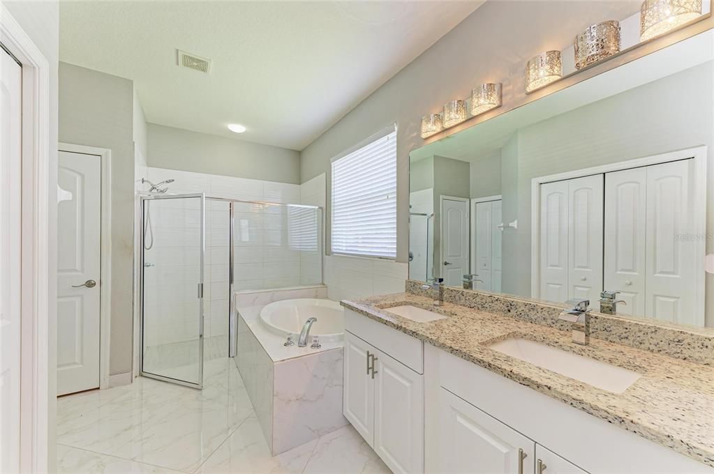 Bathroom, Dual Sink Vanities, Glass Shower, Interior, Marble, Recessed Lighting