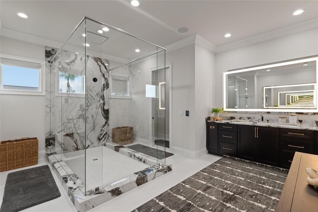 Bathroom, Dual Sink Vanities, Glass Shower, Interior, Marble Walls, Recessed Lighting