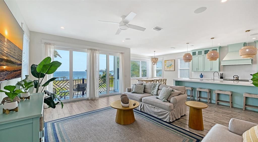 Dining room, Interior, Kitchen, Living room, Pendant Lights, Recessed Lighting, Water, Wood Texture Flooring