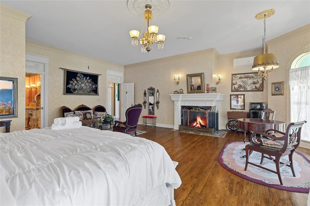 Bedroom, Chandelier, Fireplace, Interior, Pendant Lights, Wood Texture Flooring